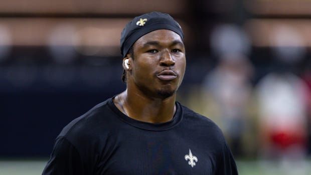New Orleans Saints running back Jamaal Williams (30) dances as he walks the hashmarks
